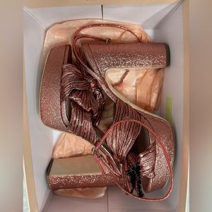 COPY - Loeffler Randall - Natalia Rose Platform Bow Heel
Color: Metallic Rose
S…